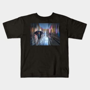 man walking in the rain with umbrella Kids T-Shirt